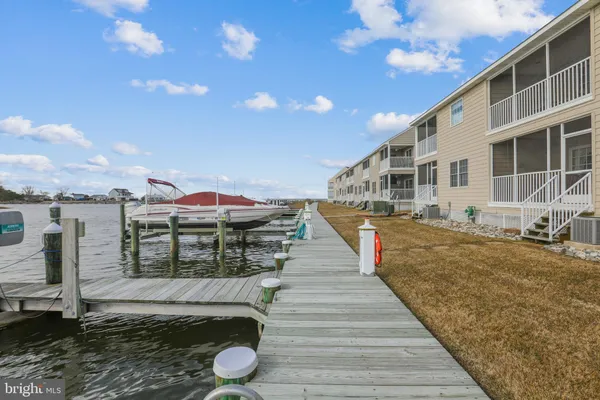 a view of a lake with sitting area