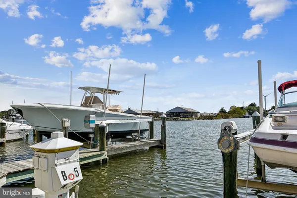 a view of roof deck with patio
