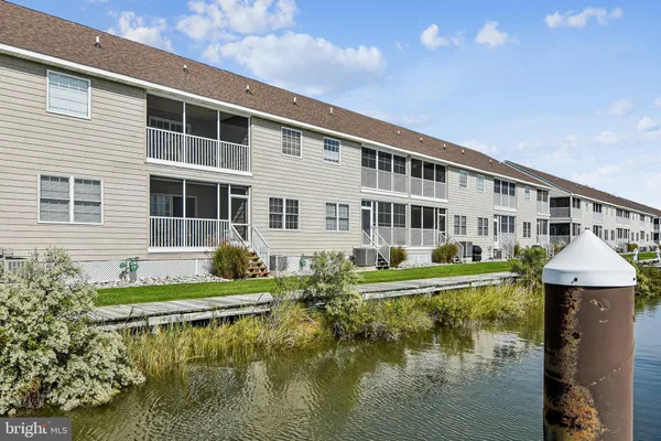 a view of a lake with a city from a terrace