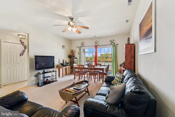a view of a balcony with furniture
