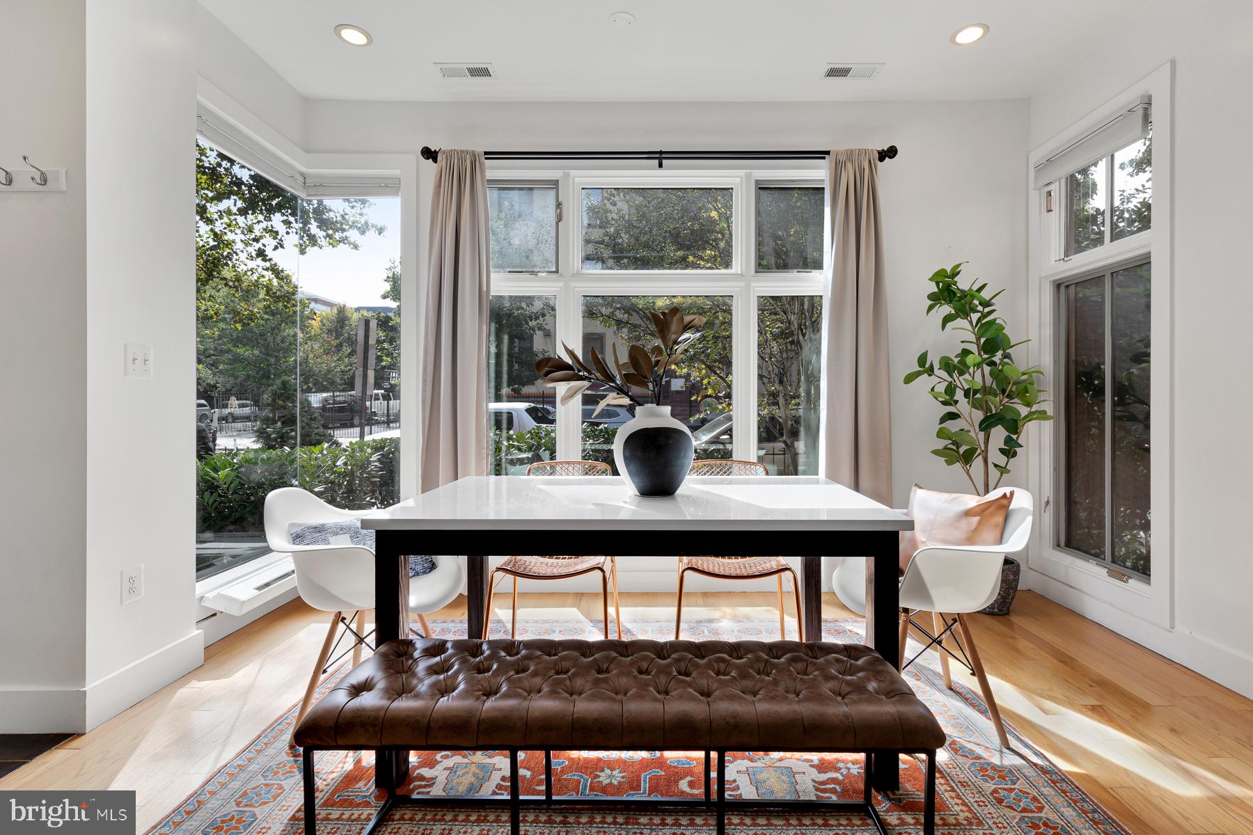 801 Q Street Northwest, Unit 1 Washington, DC 20001 - Photo 15 of 39 a dining room with furniture and window