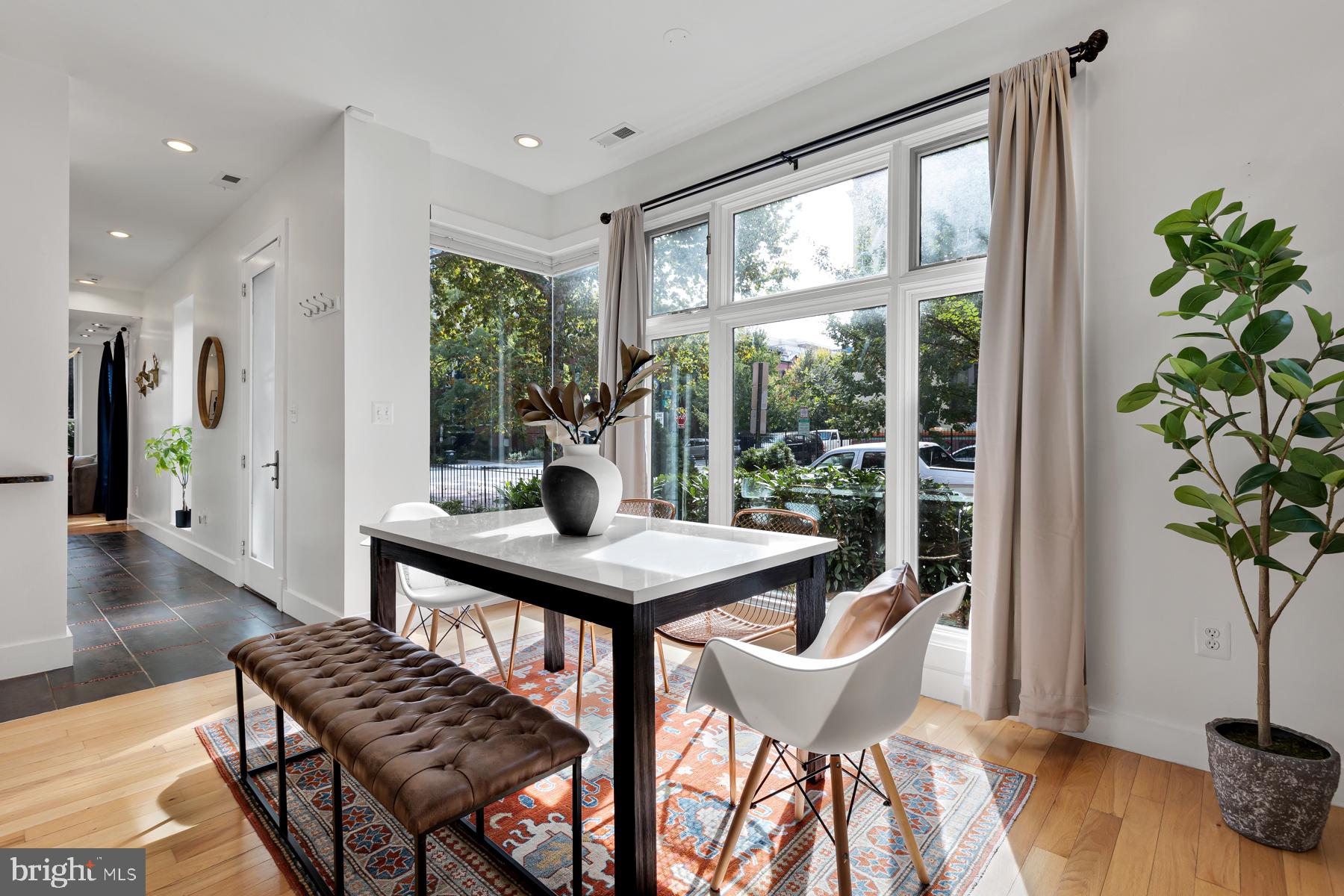 801 Q Street Northwest, Unit 1 Washington, DC 20001 - Photo 16 of 39 a view of a livingroom with furniture and window