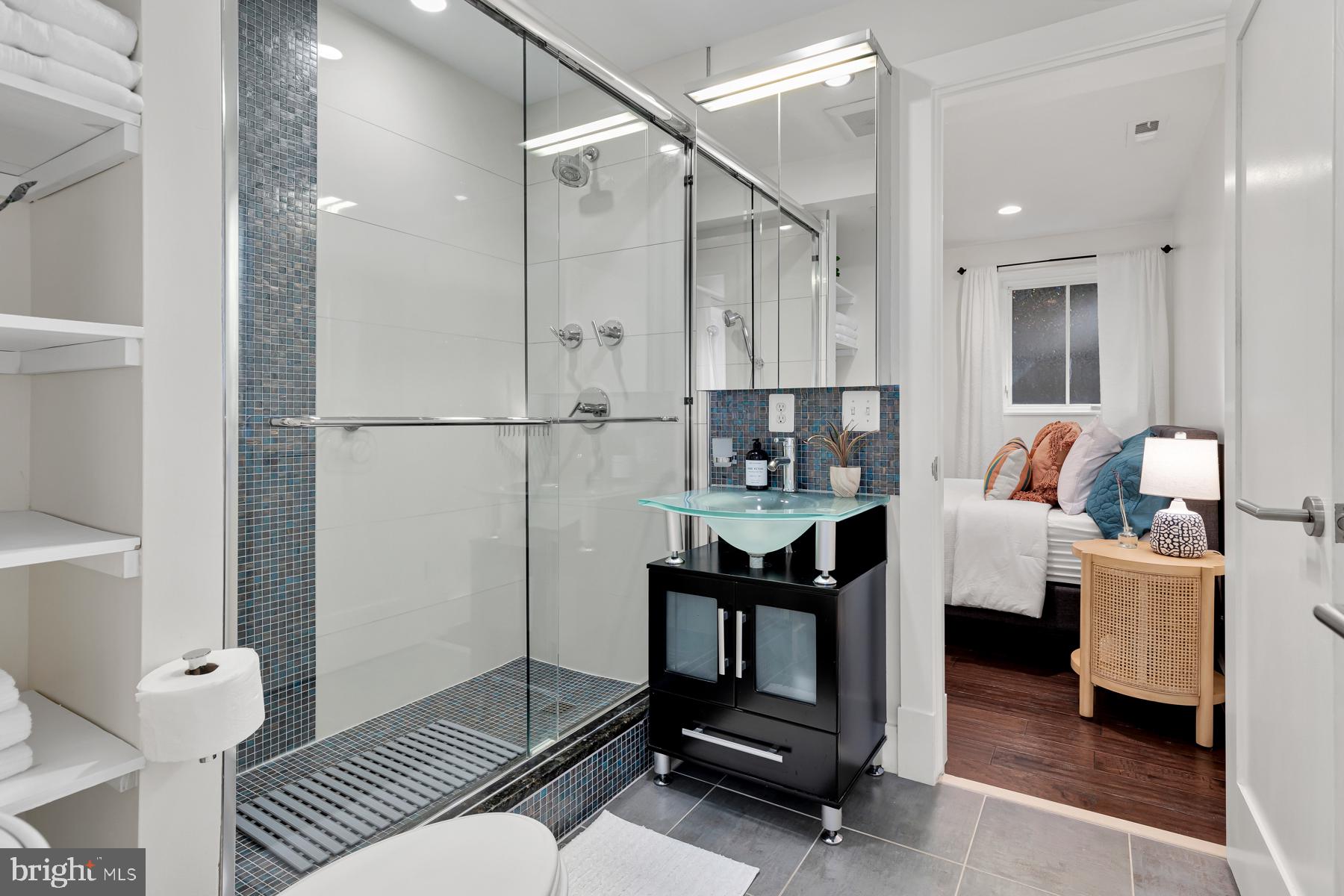 801 Q Street Northwest, Unit 1 Washington, DC 20001 - Photo 26 of 39 a living room with furniture and a rug