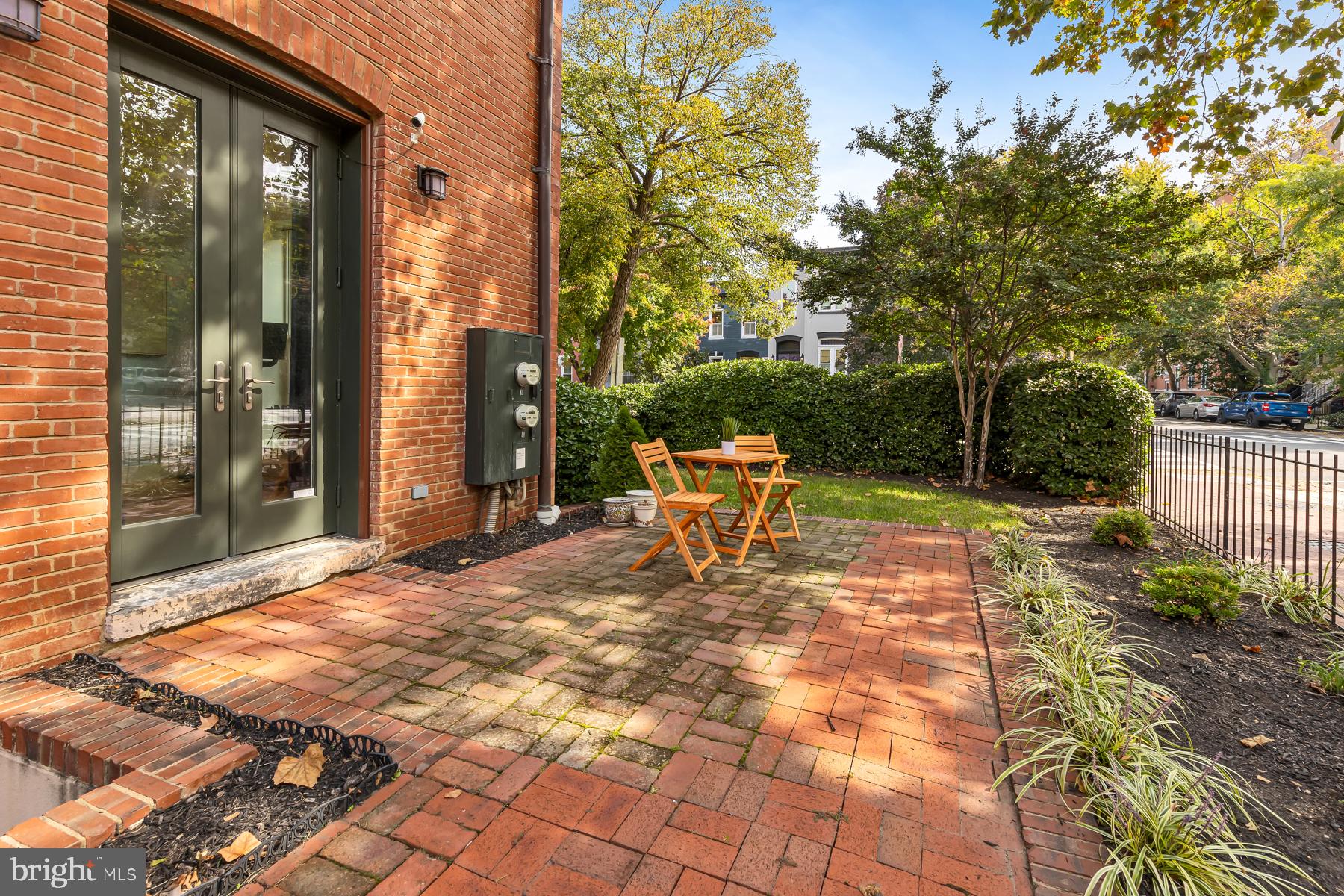 801 Q Street Northwest, Unit 1 Washington, DC 20001 - Photo 36 of 39 a white bench sitting in front of a house