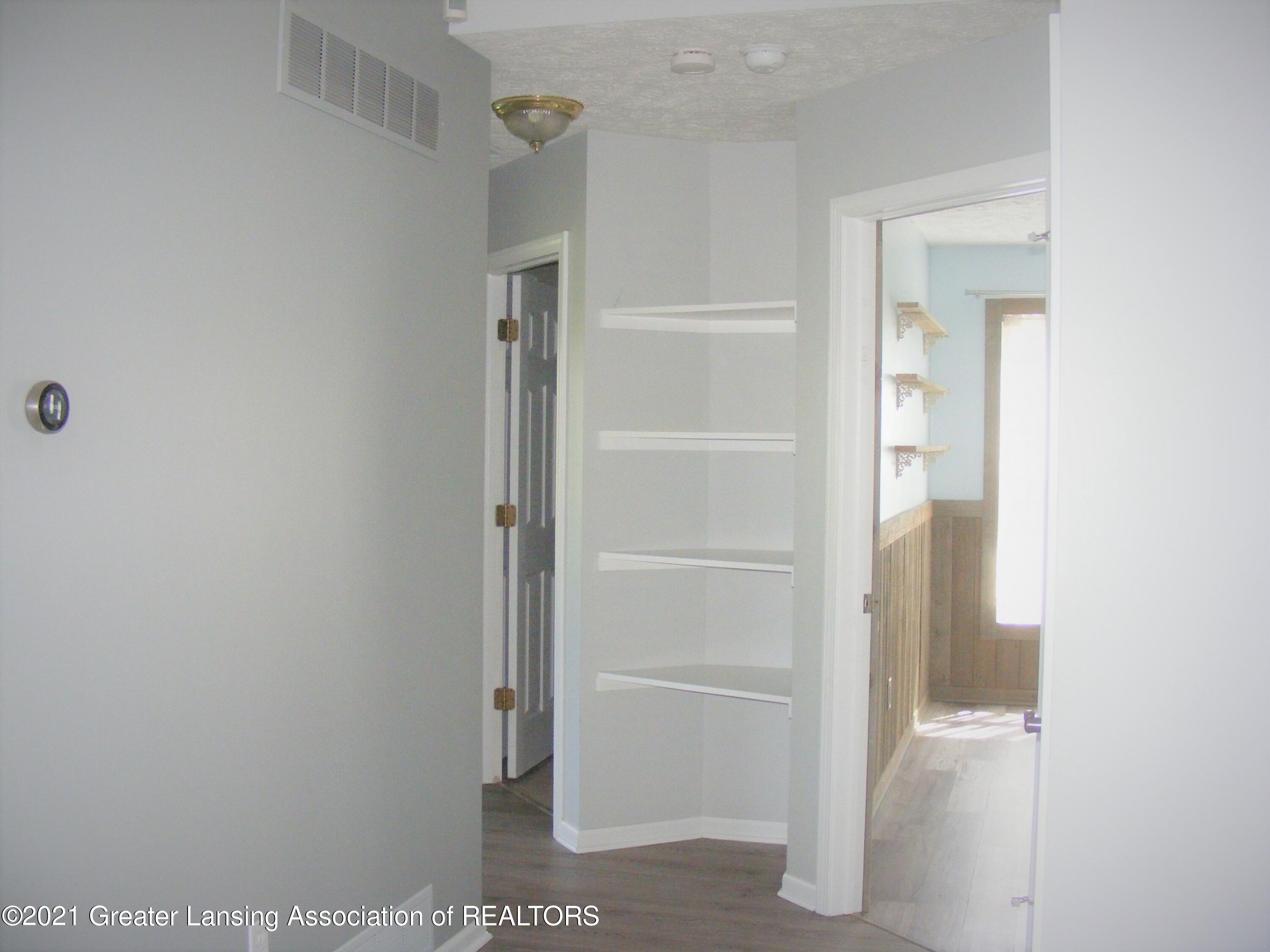 2430 South Meridian Road Ovid, MI 48866 - Photo 15 of 36 unique hallway to bedrooms