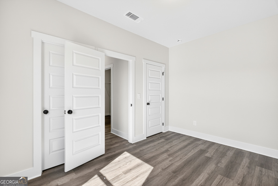 2611 Bethany Bowersville Road, Unit 5 Canon, GA 30520 - Photo 21 of 47 an empty room with wooden floor
