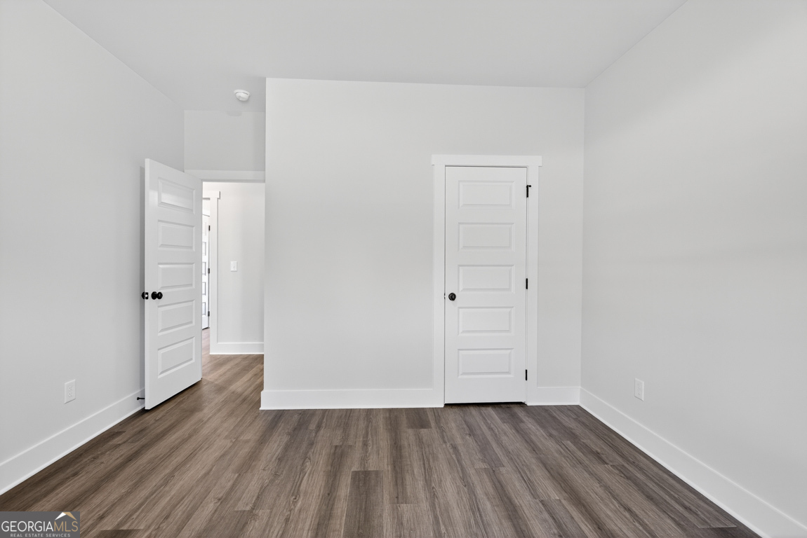2611 Bethany Bowersville Road, Unit 5 Canon, GA 30520 - Photo 31 of 47 an empty room with wooden floor