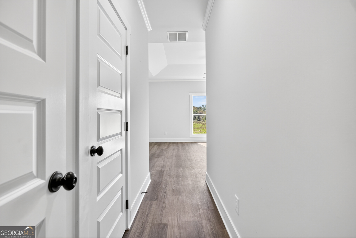2611 Bethany Bowersville Road, Unit 5 Canon, GA 30520 - Photo 35 of 47 a view of a hallway with wooden floor and staircase