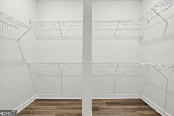 a view of a room with racks on the wall