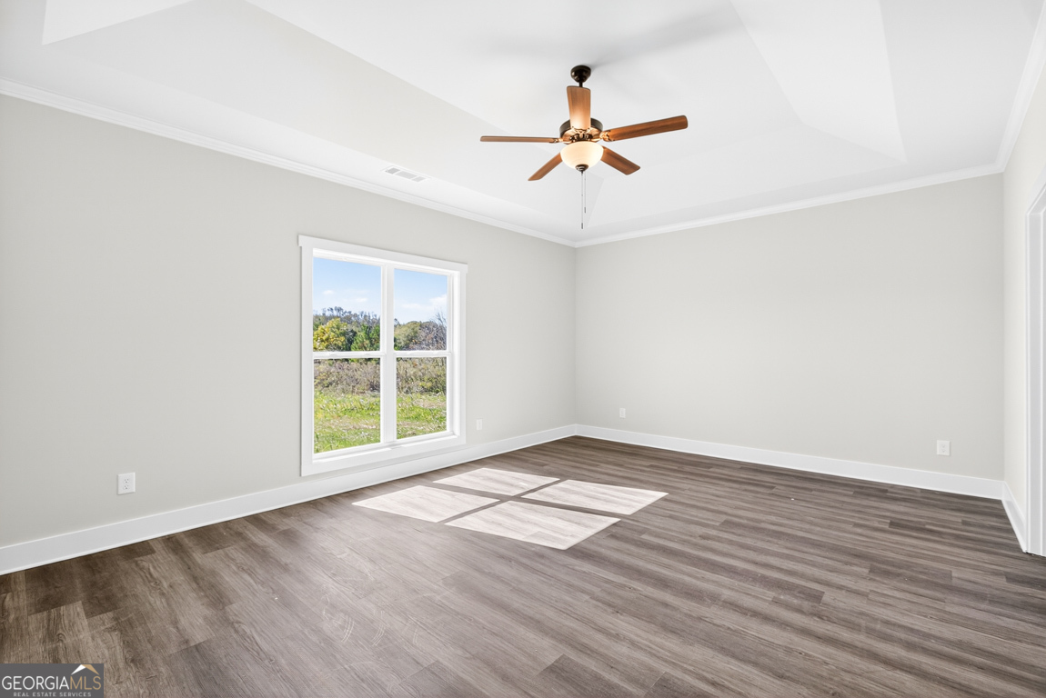 2611 Bethany Bowersville Road, Unit 5 Canon, GA 30520 - Photo 37 of 47 a view of an empty room with wooden floor and a window