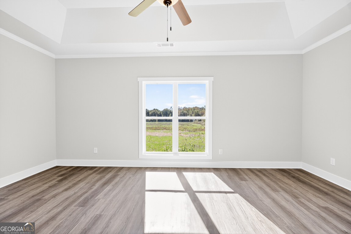 2611 Bethany Bowersville Road, Unit 5 Canon, GA 30520 - Photo 39 of 47 an empty room with wooden floor and windows