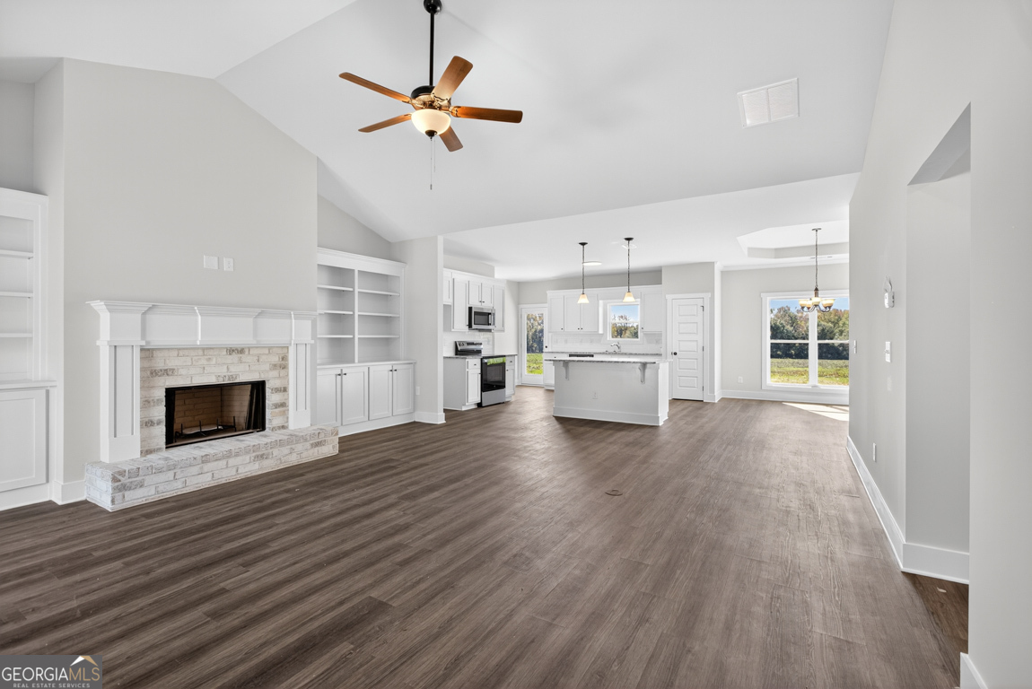 2611 Bethany Bowersville Road, Unit 5 Canon, GA 30520 - Photo 5 of 47 a view of a room with kitchen and fireplace wooden floor