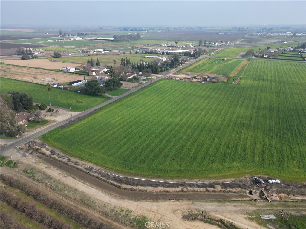 2 West Belcher Avenue Merced, CA 95348 - Photo 3 of 3 an aerial view of a golf course with parking space