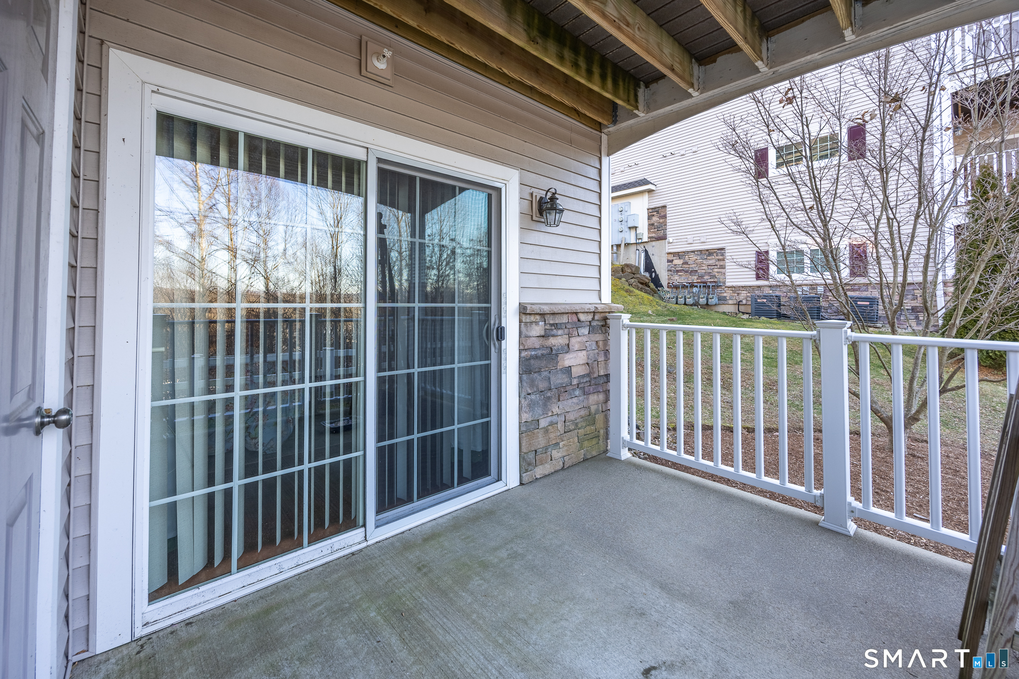 95 South Ridge Lane, Unit FGL2 Berlin, CT 06037 - Photo 25 of 33 a view of a porch with wooden floor