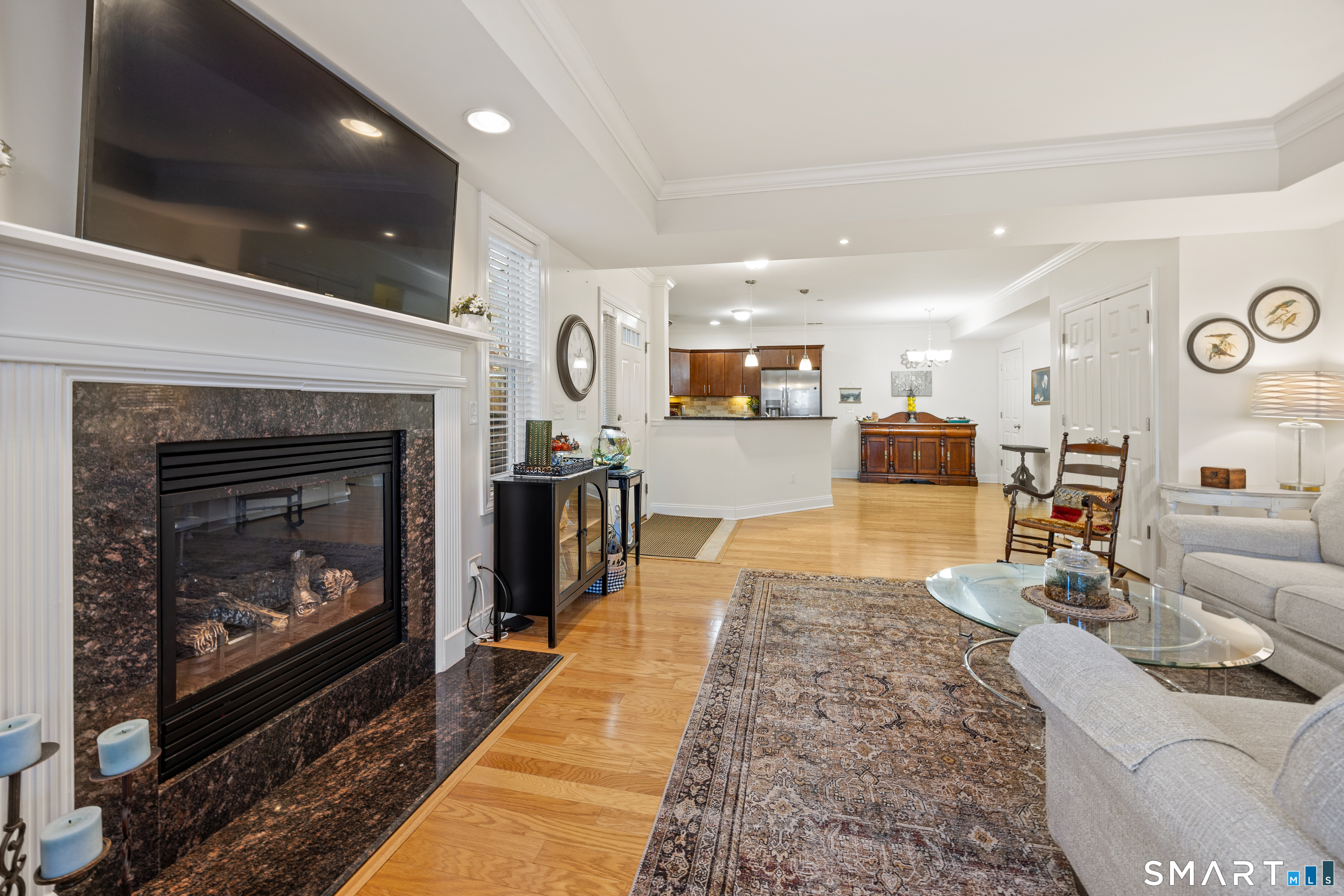 95 South Ridge Lane, Unit FGL2 Berlin, CT 06037 - Photo 8 of 33 a living room with furniture and a fireplace