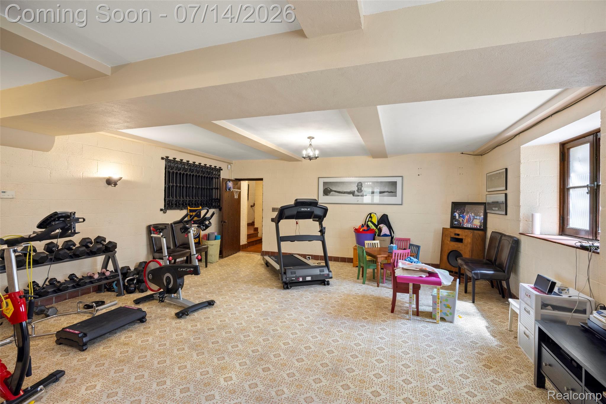 189 Cloverly Road Grosse Pointe, MI 48236 - Photo 64 of 96 Spacious room featuring patterned carpet flooring and a beamed ceiling