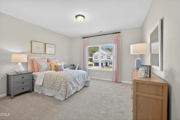 a bed room with a bed and a night stand