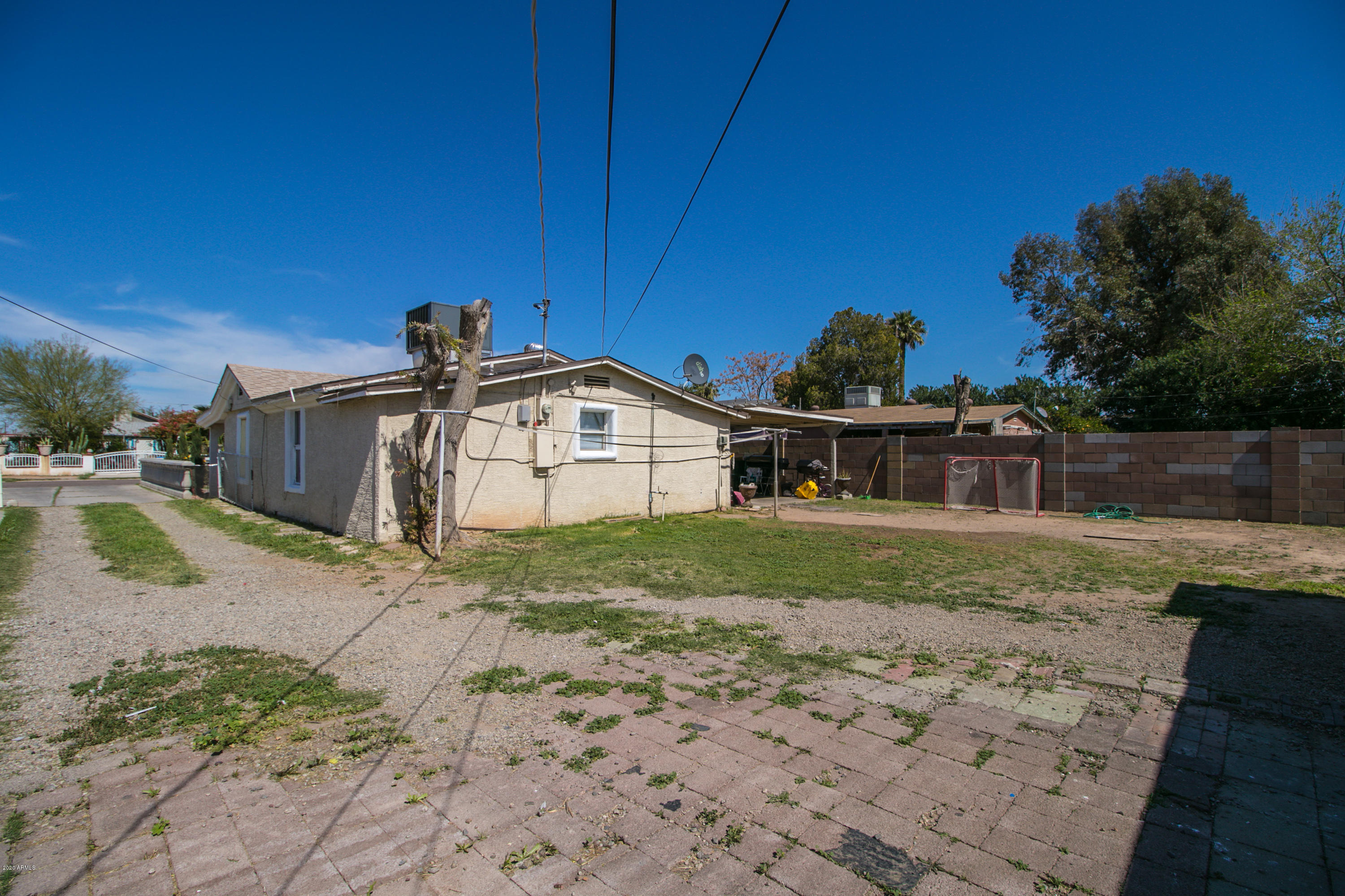 3537 West Granada Road Phoenix, AZ 85009 - Photo 22 of 40 backyard and front house