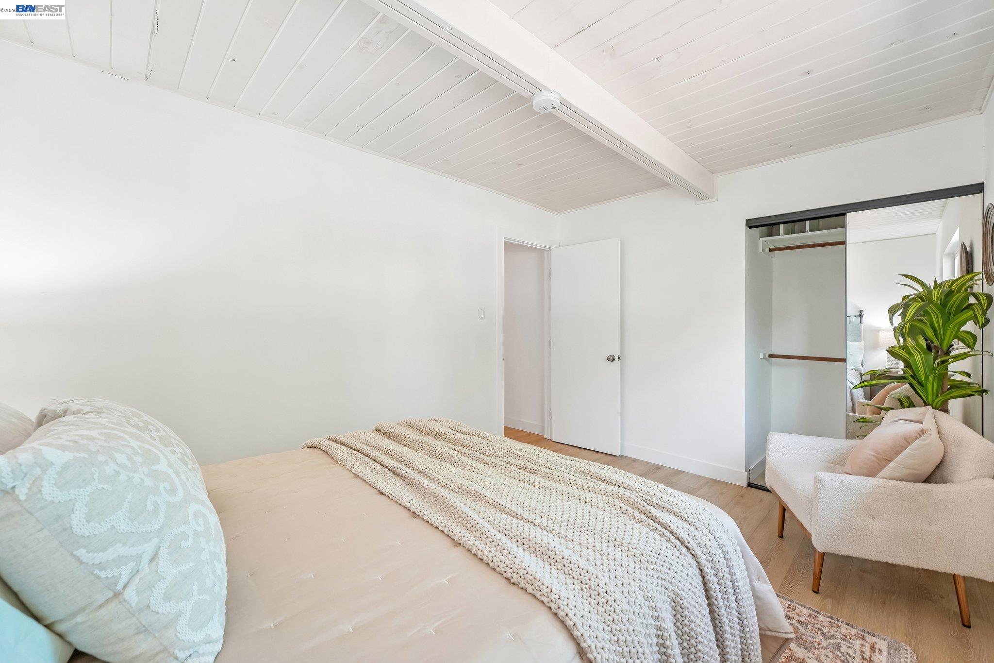 606 West 9th Street Santa Rosa, CA 95401 - Photo 42 of 52 a bedroom with a bed and a couch