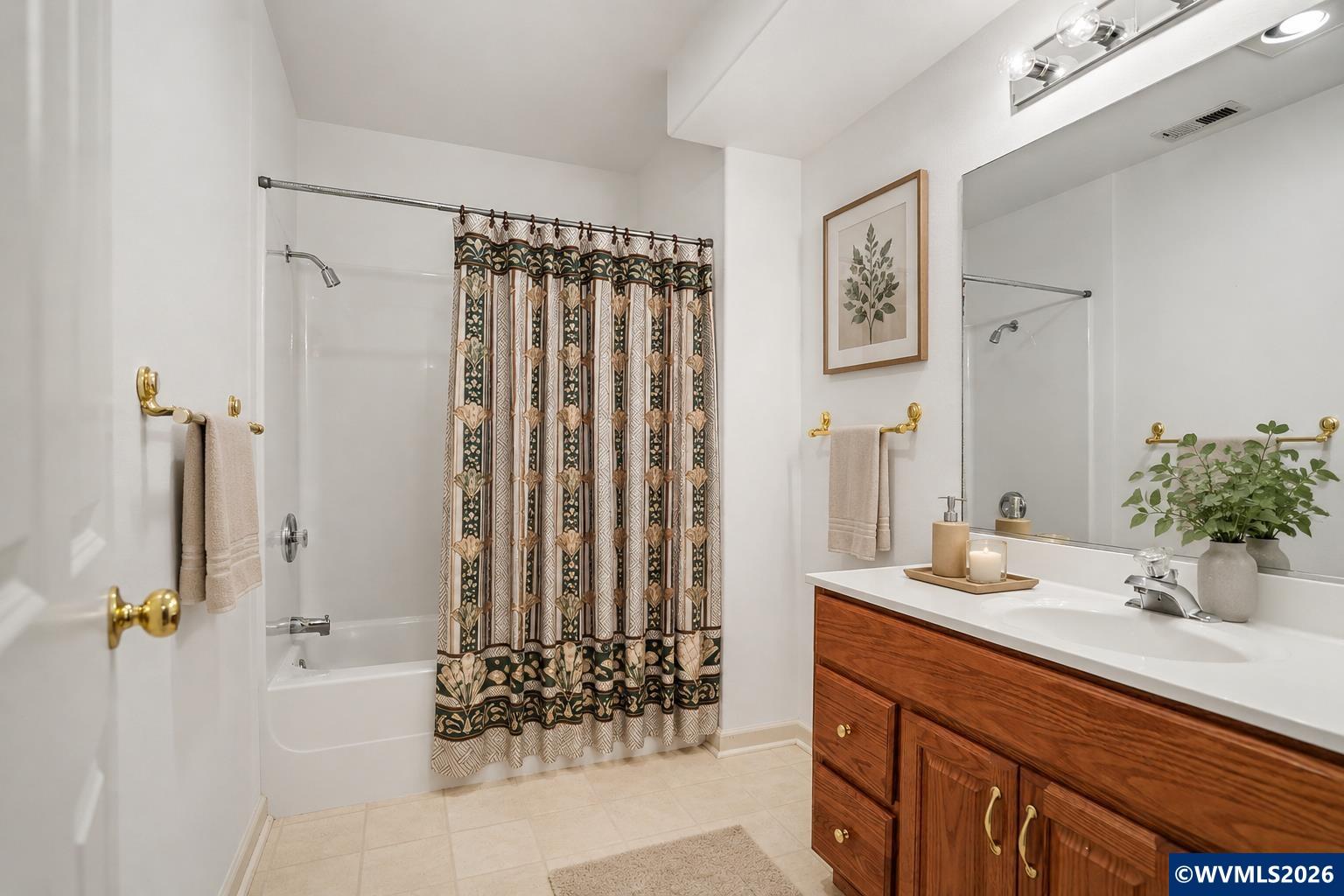 1299 Twin Hills Road Southeast Jefferson, OR 97352 - Photo 29 of 47 a bathroom with a double vanity sink and a mirror