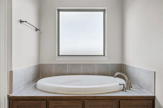 a bathroom with a sink and a bathtub
