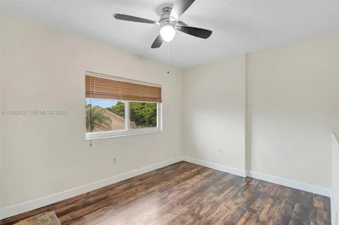 a utility room with cabinets