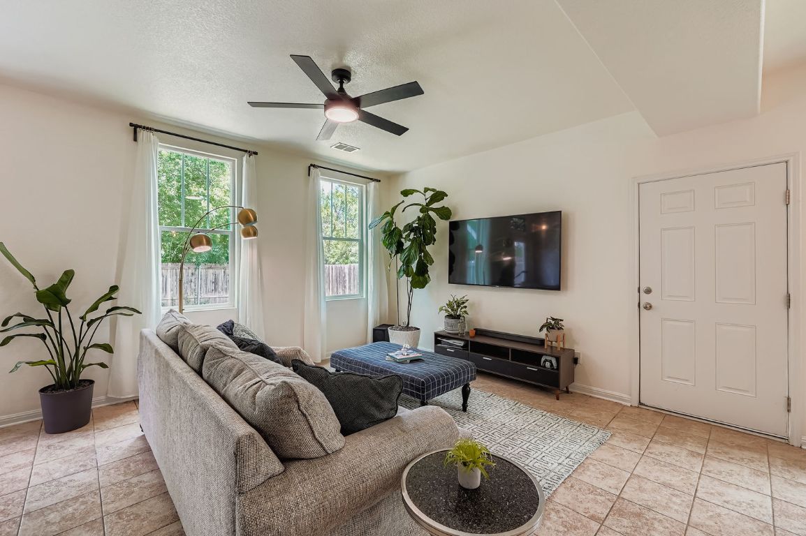 229 Ferrule Drive Kyle, TX 78640 - Photo 5 of 28 a living room with furniture and a window