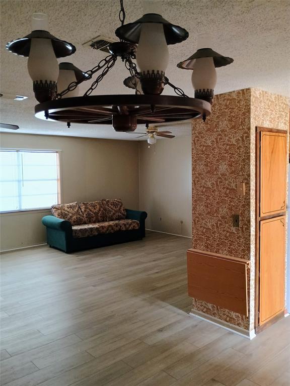 1303 East Boynton Hamilton, TX 76531 - Photo 16 of 21 a living room with furniture