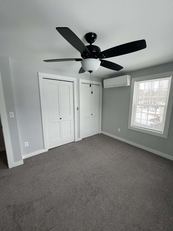 313-315 Walnut Hill Road Orange, MA 01364 - Photo 17 of 19 a view of an empty room with a window