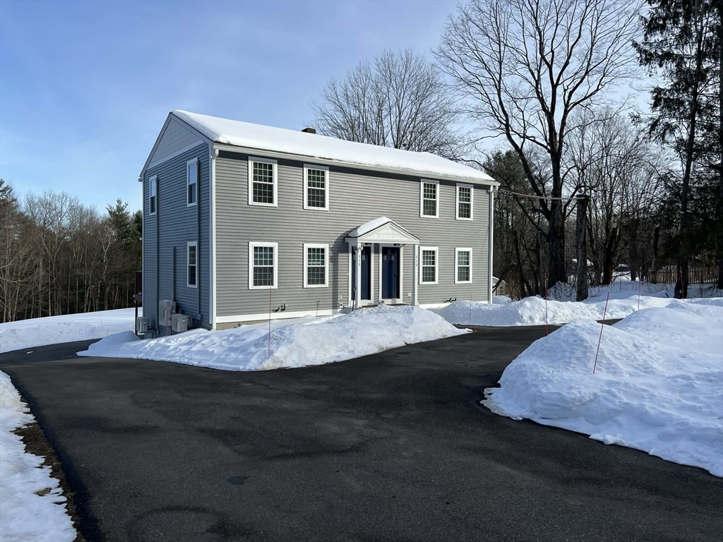 313-315 Walnut Hill Road Orange, MA 01364 - Photo 2 of 19 a backyard of a house