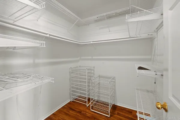 a front view of a house with a yard and a garage