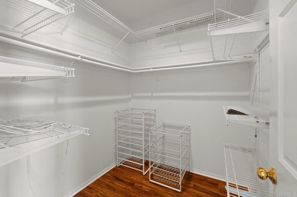5402 Renaissance Avenue San Diego, CA 92122 - Photo 46 of 73 a view of walk in closet with clothes