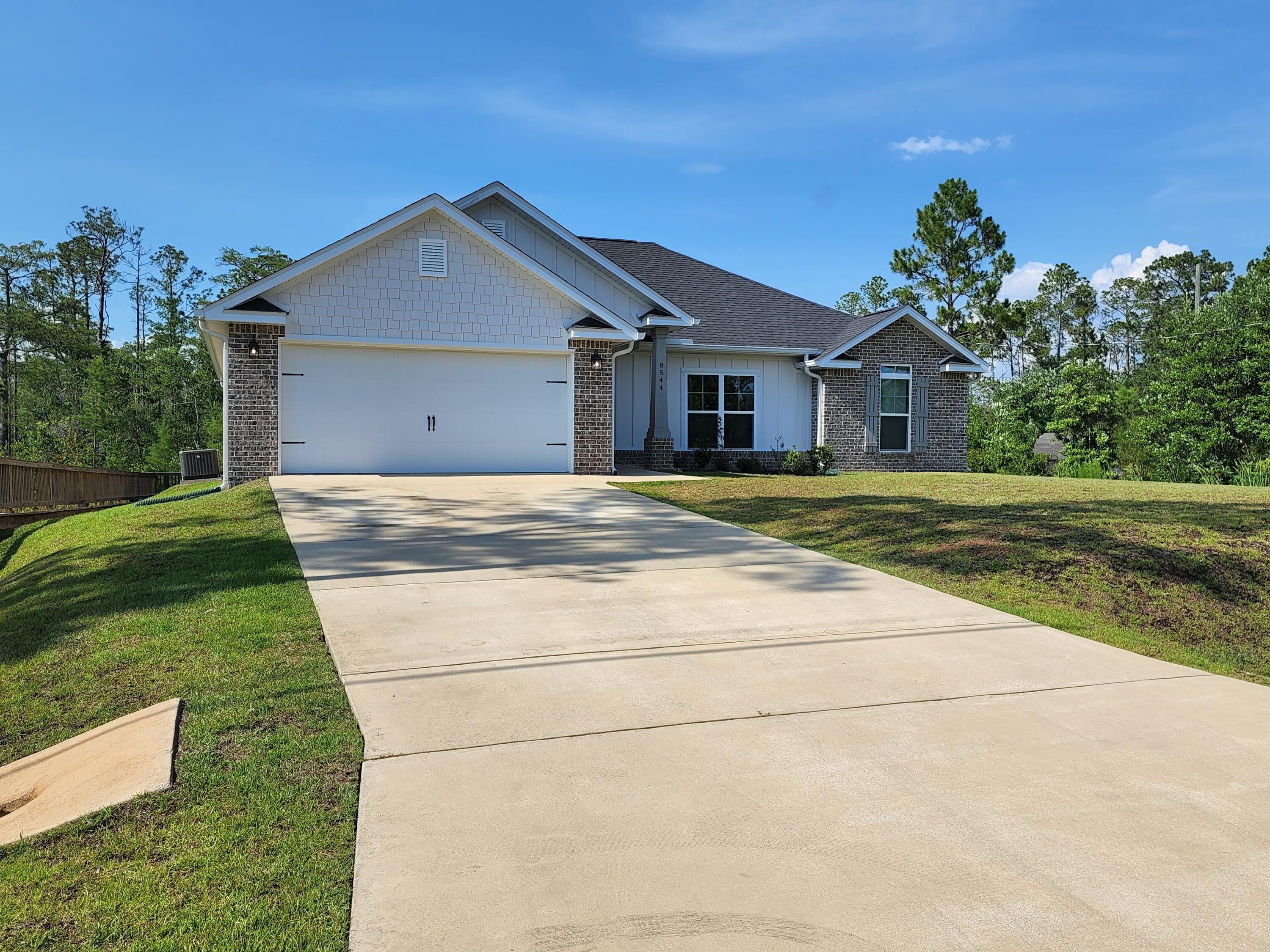 8544 Bay River Road Navarre, FL 32566 - Photo 1 of 40 Gallery Image 1