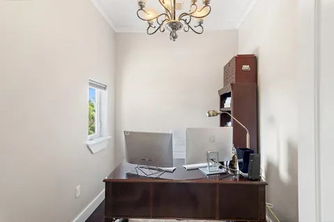 a view of workspace with wooden floor