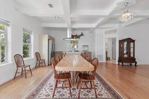 a view of a patio with couches chairs and a table and chairs