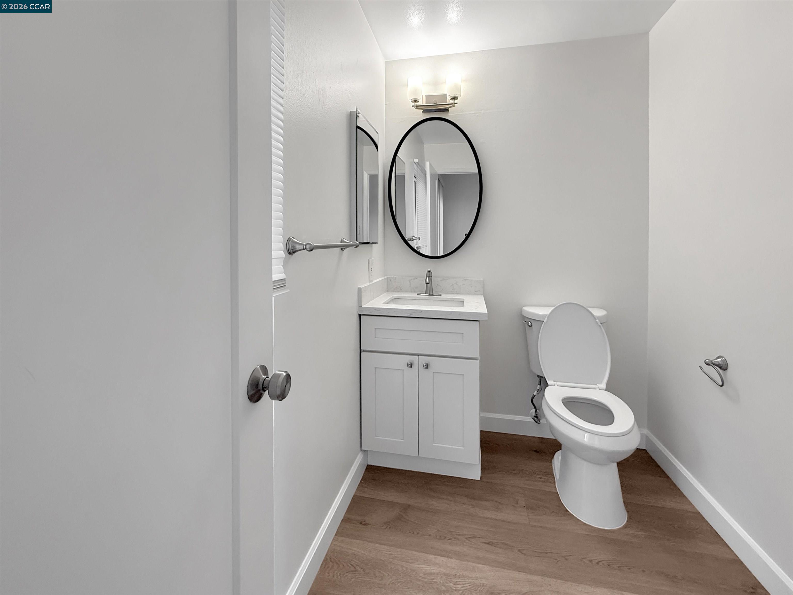 1919 Ygnacio Valley Road, Unit 55 Walnut Creek, CA 94598 - Photo 14 of 33 a bathroom with a toilet and a sink