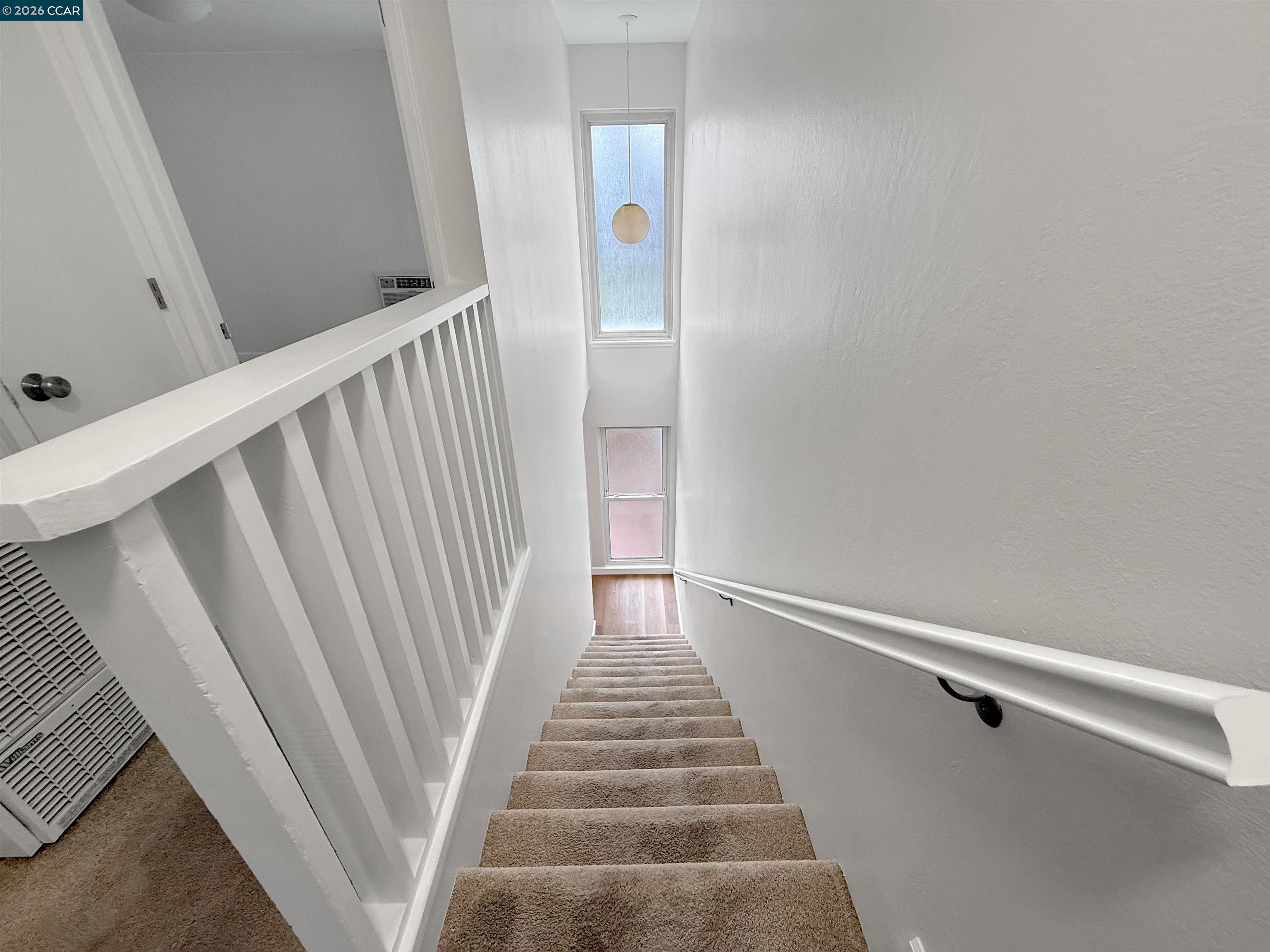 1919 Ygnacio Valley Road, Unit 55 Walnut Creek, CA 94598 - Photo 16 of 33 a view of a hallway view with staircase