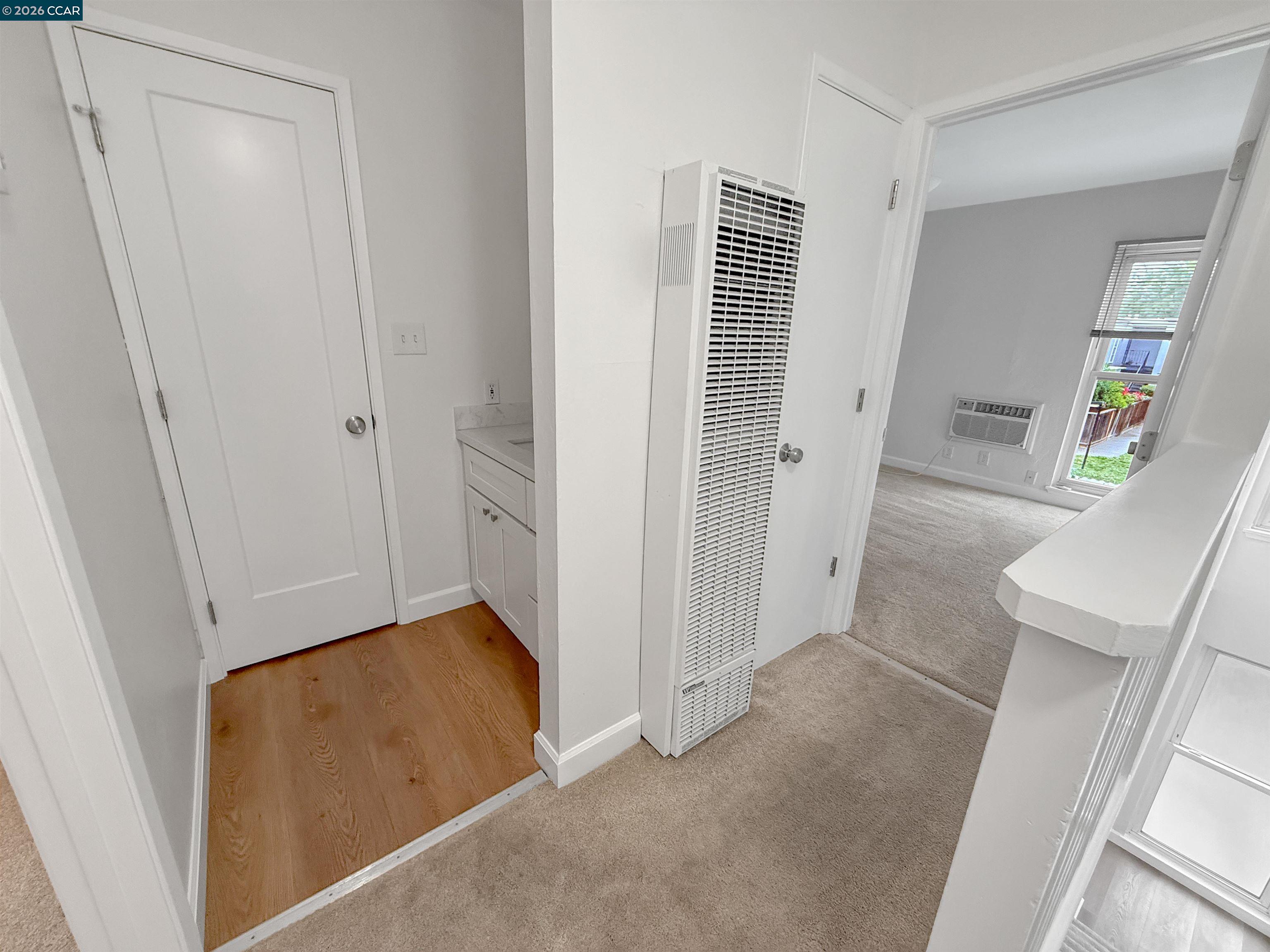 1919 Ygnacio Valley Road, Unit 55 Walnut Creek, CA 94598 - Photo 17 of 33 a view of room with window and hardwood floor