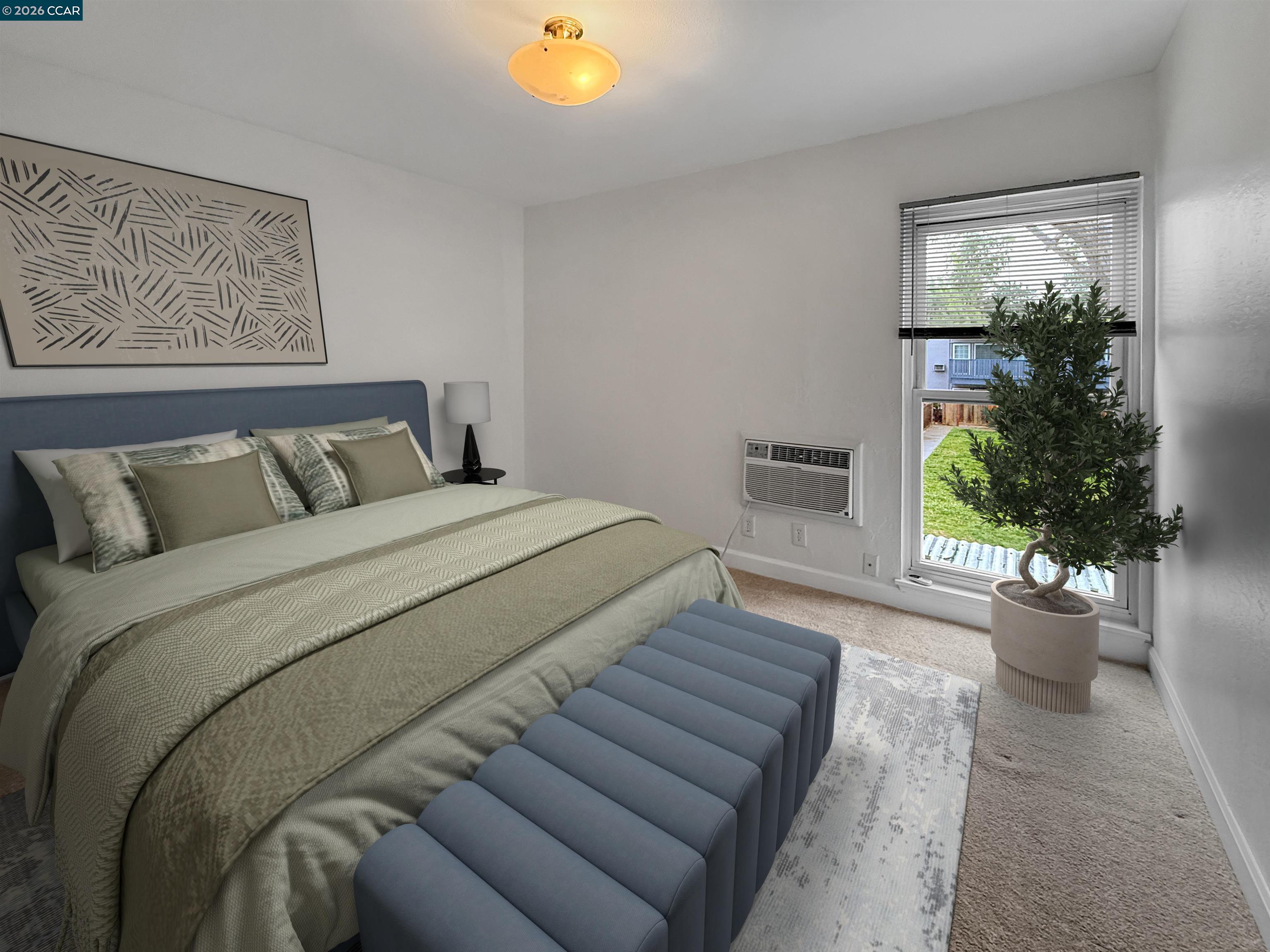 1919 Ygnacio Valley Road, Unit 55 Walnut Creek, CA 94598 - Photo 20 of 33 a bed sitting in a bedroom next to a window with potted plants