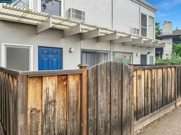 a view of entrance gate of a house