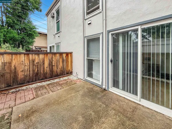 a view of a balcony with an outdoor space