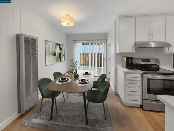 a view of a kitchen area with furniture and window