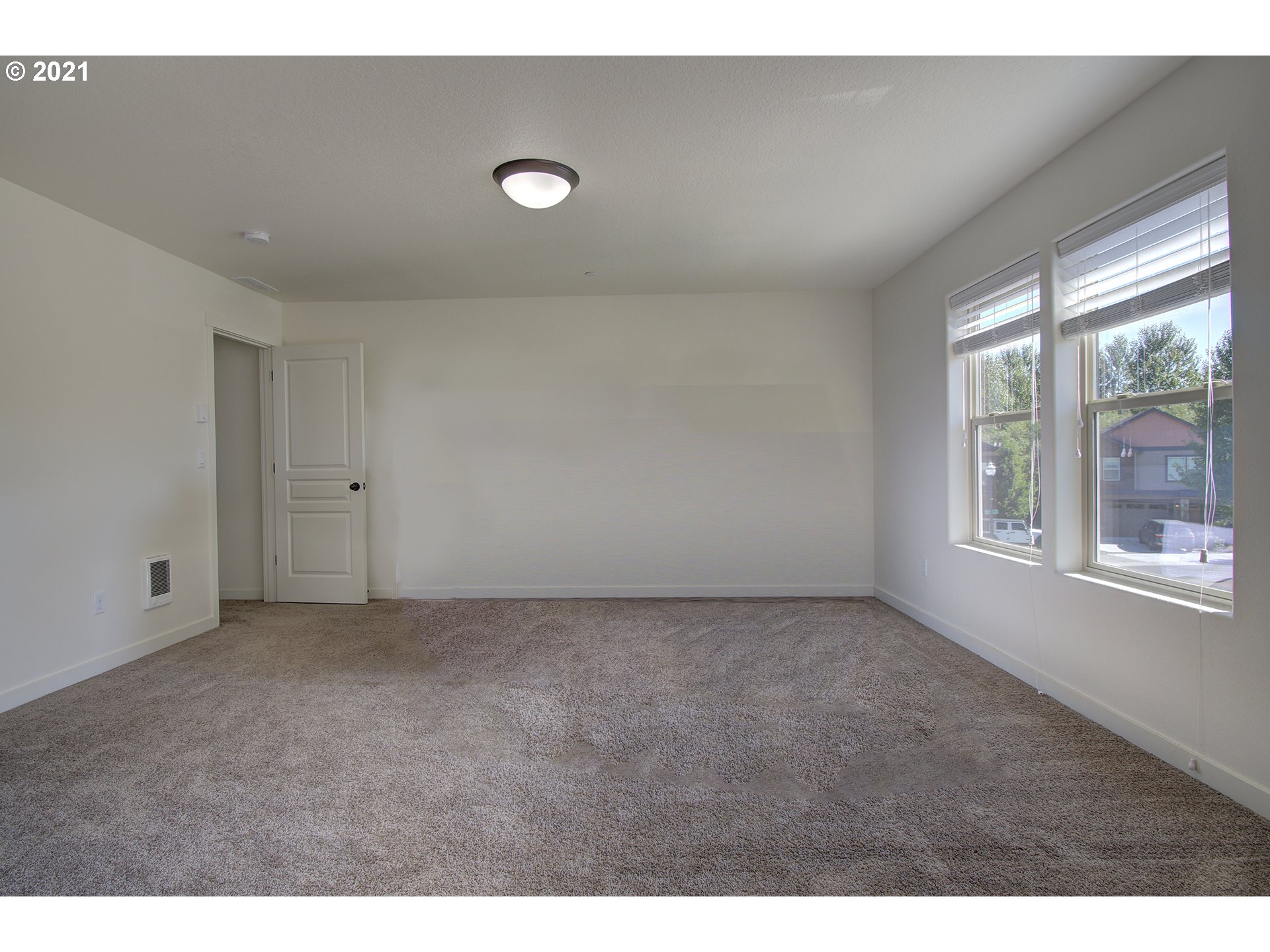162 North 41st Place Ridgefield, WA 98642 - Photo 16 of 29 a view of an empty room with a window