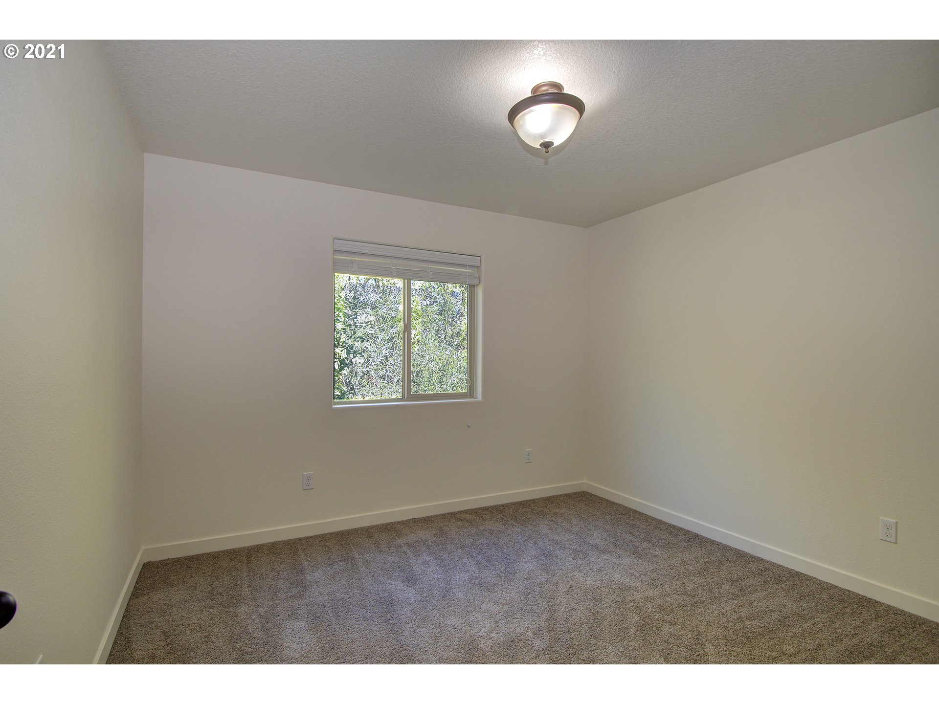 162 North 41st Place Ridgefield, WA 98642 - Photo 23 of 29 a view of an empty room with a window