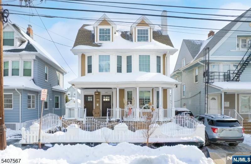 a view of a brick building with many windows