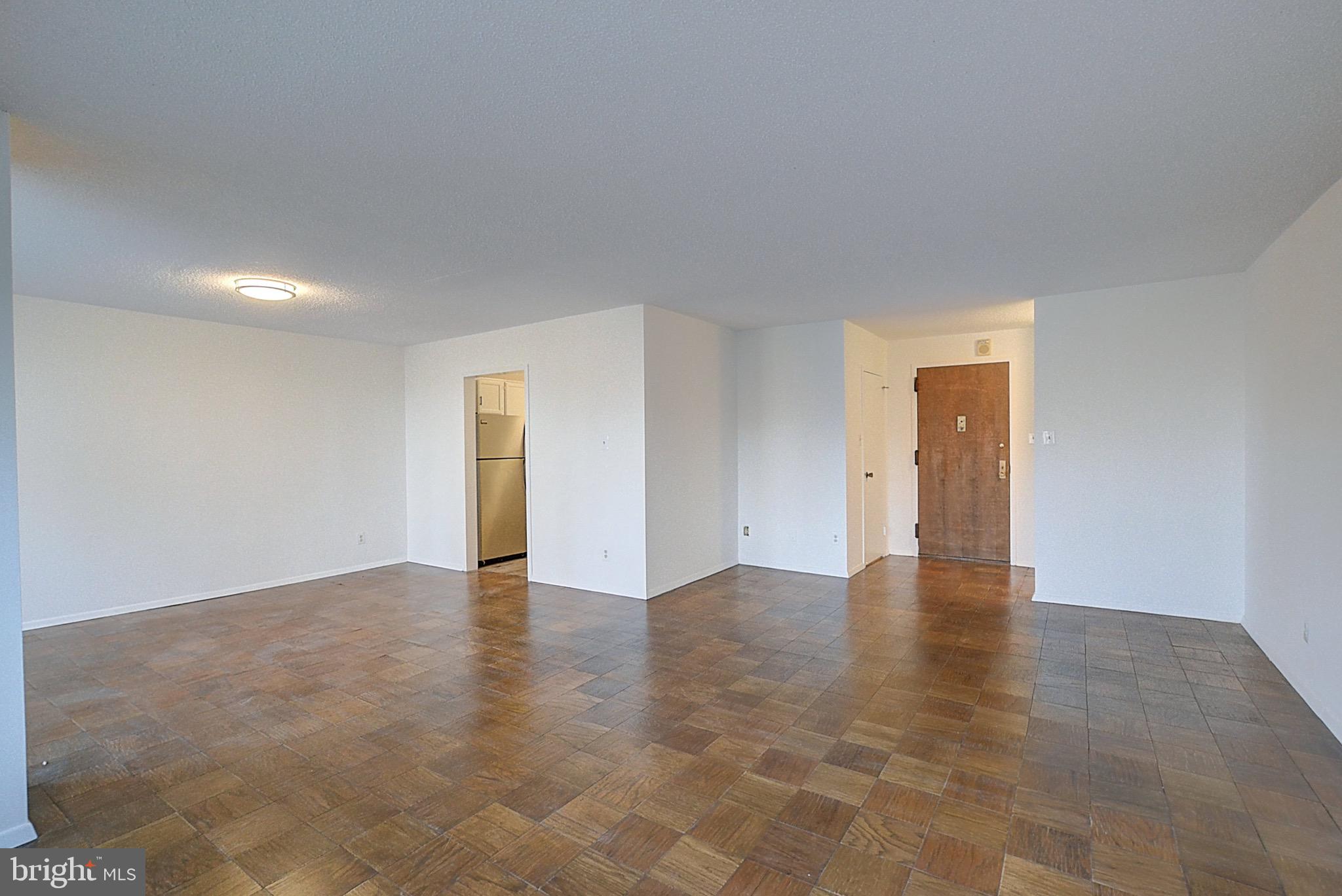 5225 Pooks Hill Road, Unit 324N Bethesda, MD 20814 - Photo 4 of 34 a view of an empty room and window