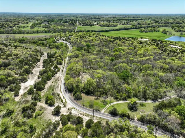 a view of a lush green field