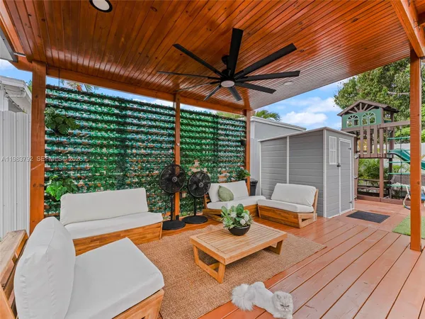 a outdoor living space with furniture and garden view