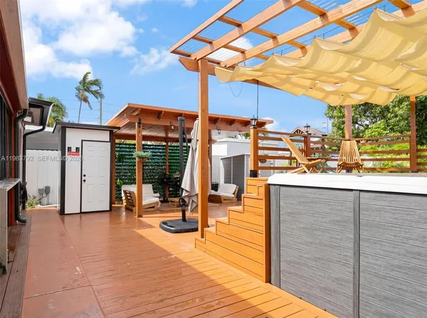 a view of a chairs and tables in the patio
