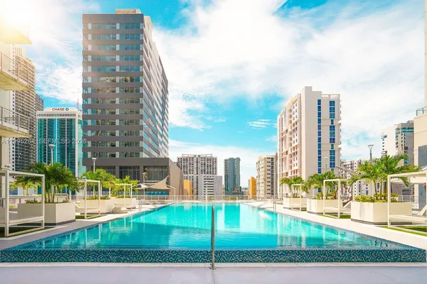 a view of a city with tall buildings